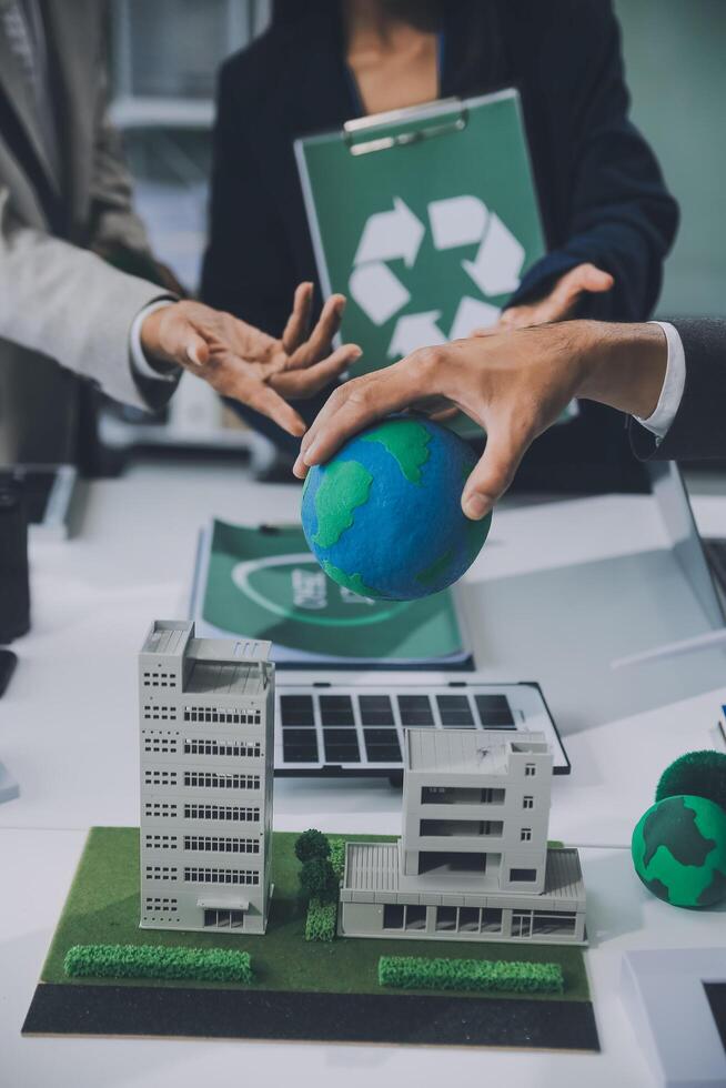 Carbon offset price report CO2 emission. Future growth Net zero waste in ESG ethical SME office protect climate change global warming social issues project. Group of asia people Eco friendly SDGs plan photo