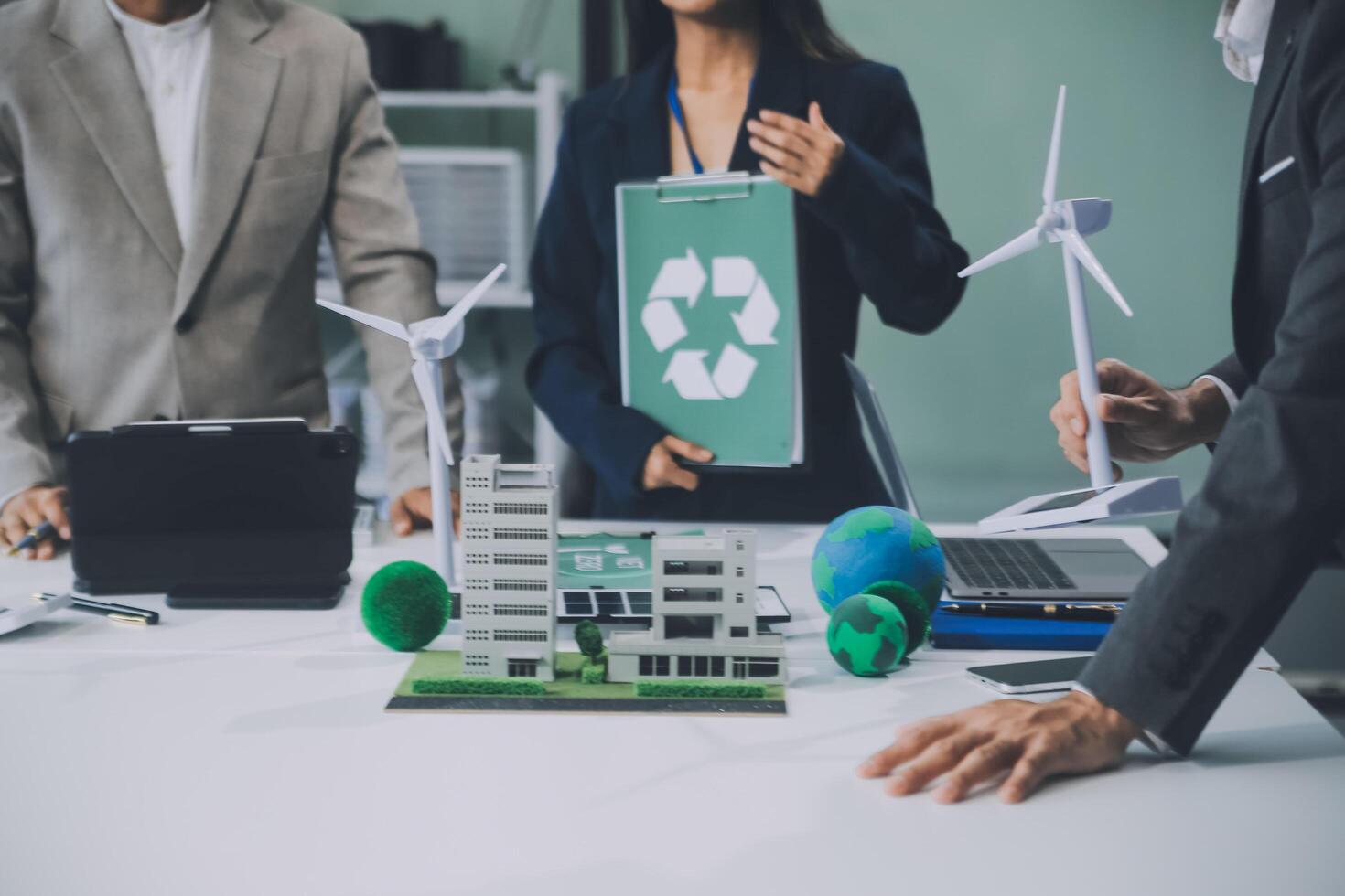 Carbon offset price report CO2 emission. Future growth Net zero waste in ESG ethical SME office protect climate change global warming social issues project. Group of asia people Eco friendly SDGs plan photo