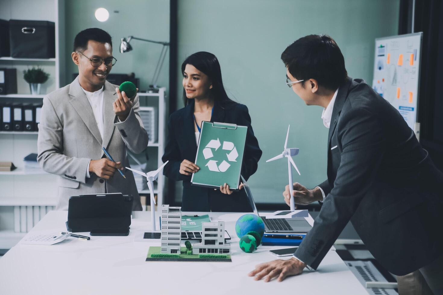 Carbon offset price report CO2 emission. Future growth Net zero waste in ESG ethical SME office protect climate change global warming social issues project. Group of asia people Eco friendly SDGs plan photo