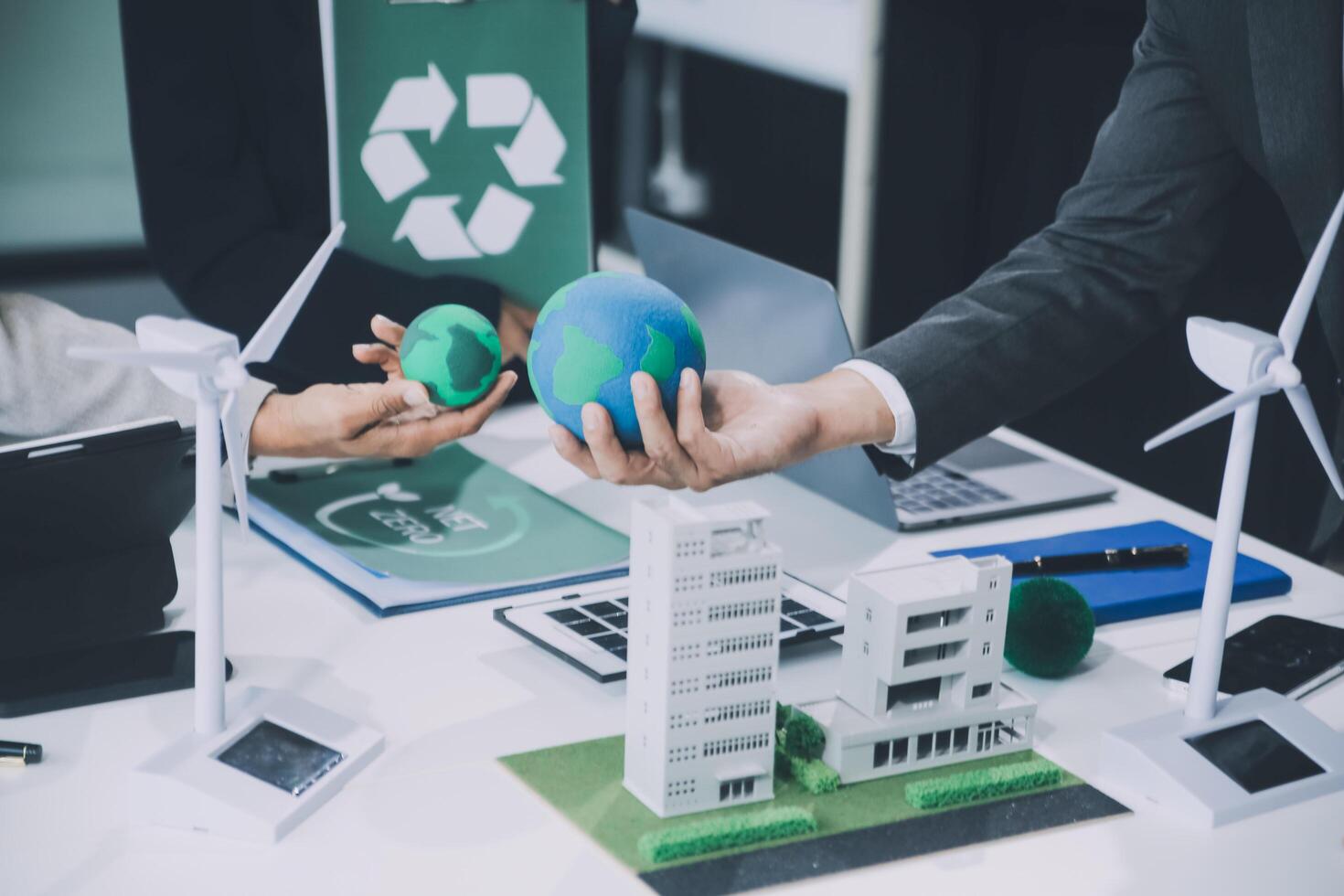 Carbon offset price report CO2 emission. Future growth Net zero waste in ESG ethical SME office protect climate change global warming social issues project. Group of asia people Eco friendly SDGs plan photo
