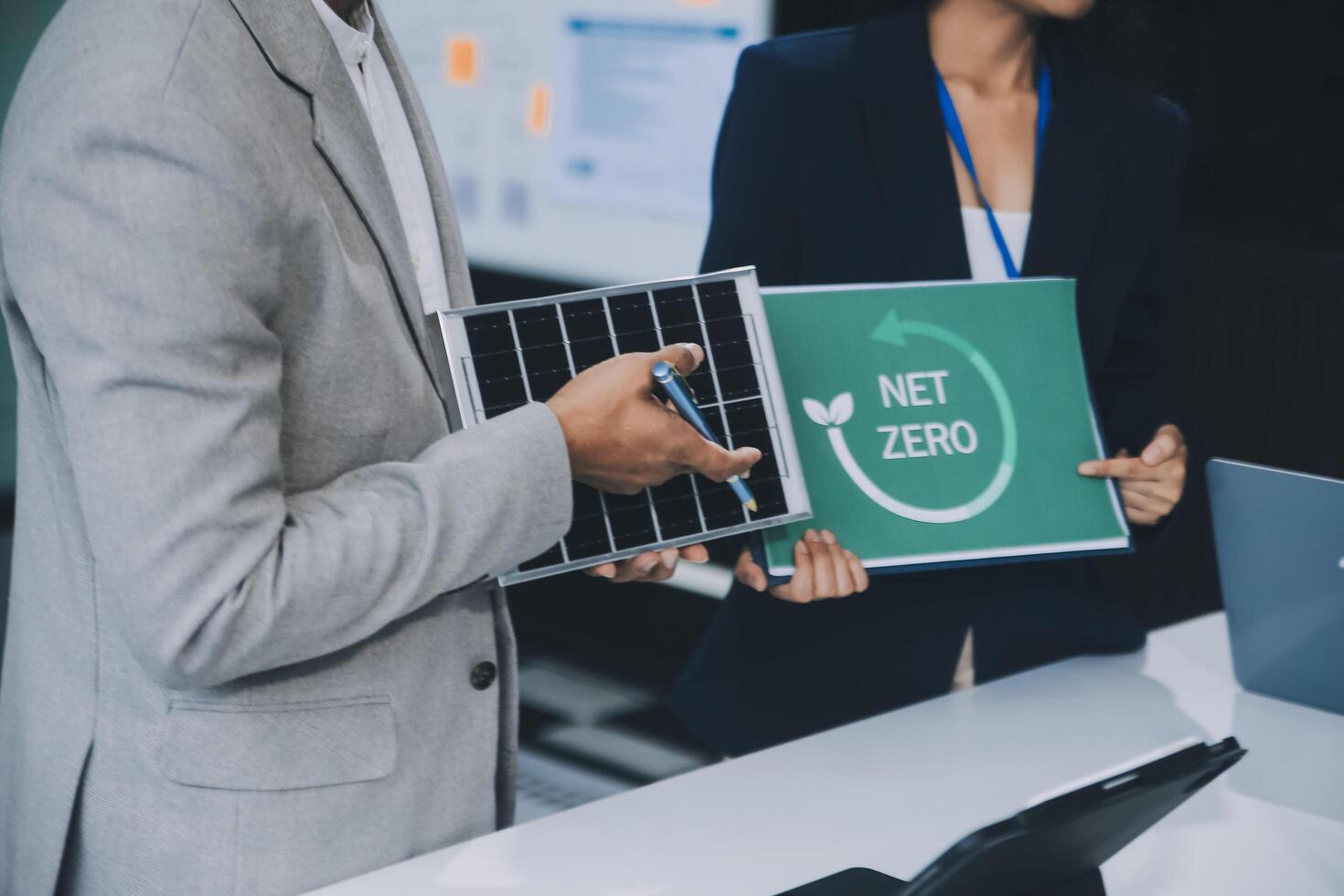 Carbon offset price report CO2 emission. Future growth Net zero waste in ESG ethical SME office protect climate change global warming social issues project. Group of asia people Eco friendly SDGs plan photo