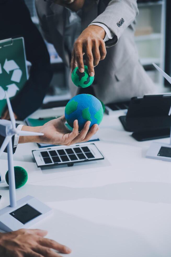 Carbon offset price report CO2 emission. Future growth Net zero waste in ESG ethical SME office protect climate change global warming social issues project. Group of asia people Eco friendly SDGs plan photo