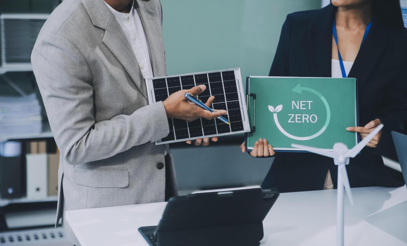 Carbon offset price report CO2 emission. Future growth Net zero waste in ESG ethical SME office protect climate change global warming social issues project. Group of asia people Eco friendly SDGs plan photo