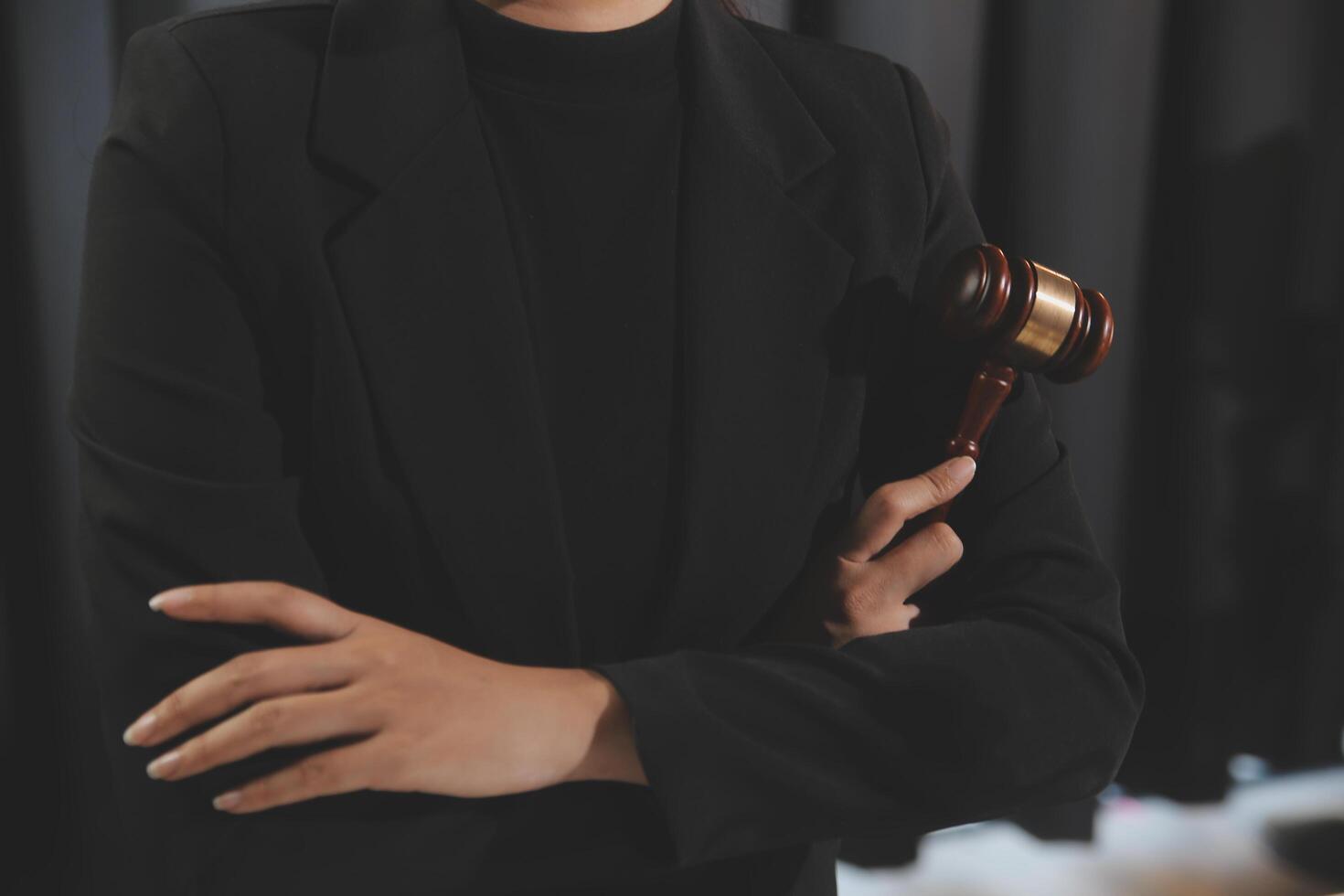 Law theme, gavel or mallet of the judge, lawyer enforcement officers, evidence-based cases taken into account in the court abount business, legislation. photo