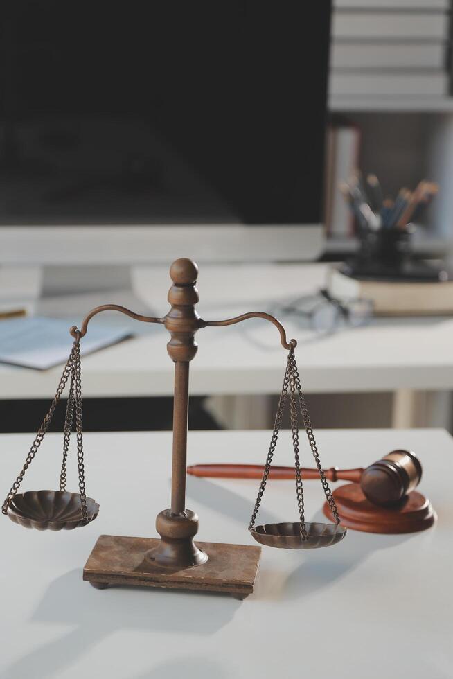 Law theme, gavel or mallet of the judge, lawyer enforcement officers, evidence-based cases taken into account in the court abount business, legislation. photo