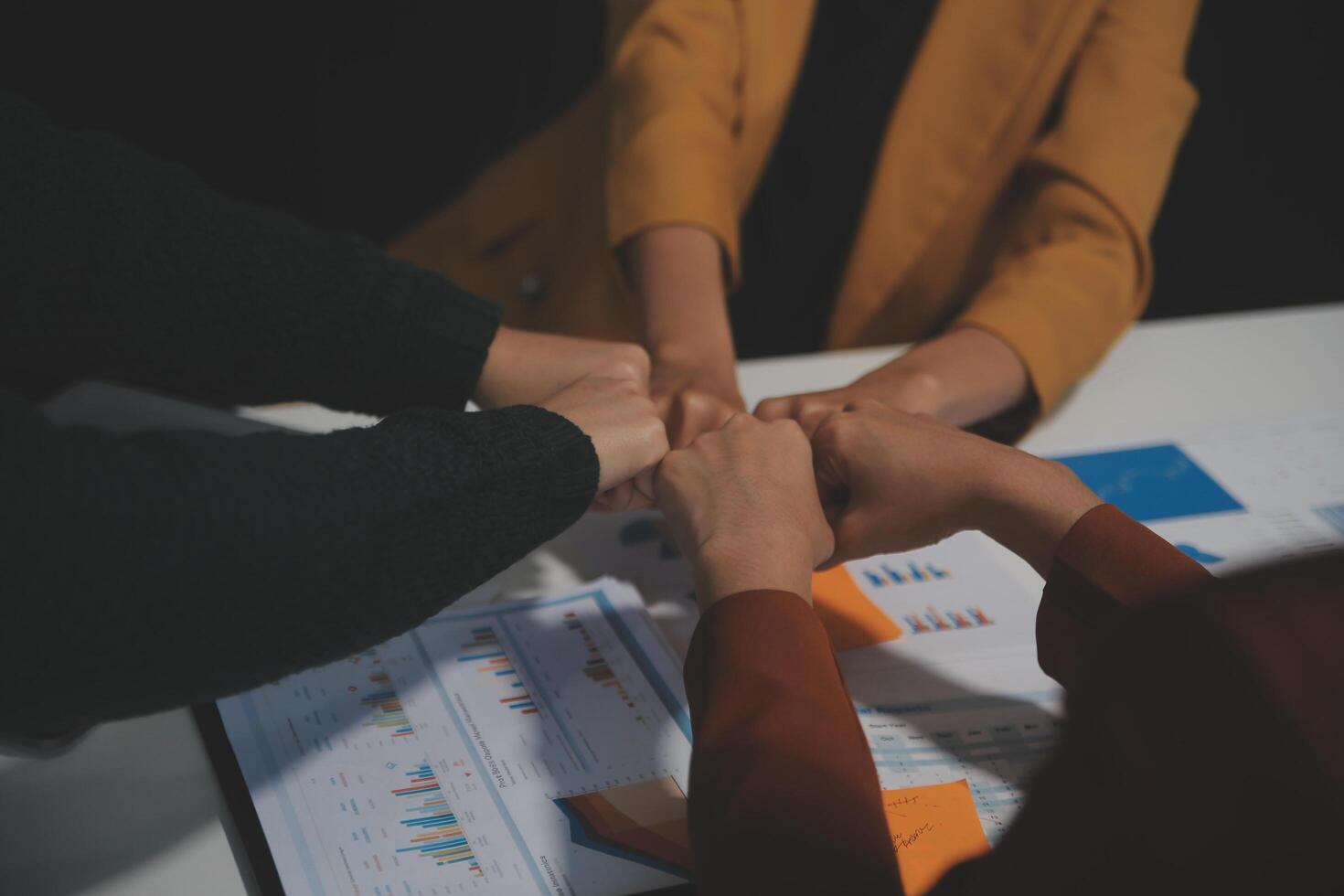 Hand join together for work togetherness, Hand stack for business and service, Team volunteering or teamwork. Concept connection of community and charity. Group of business workforce participation. photo