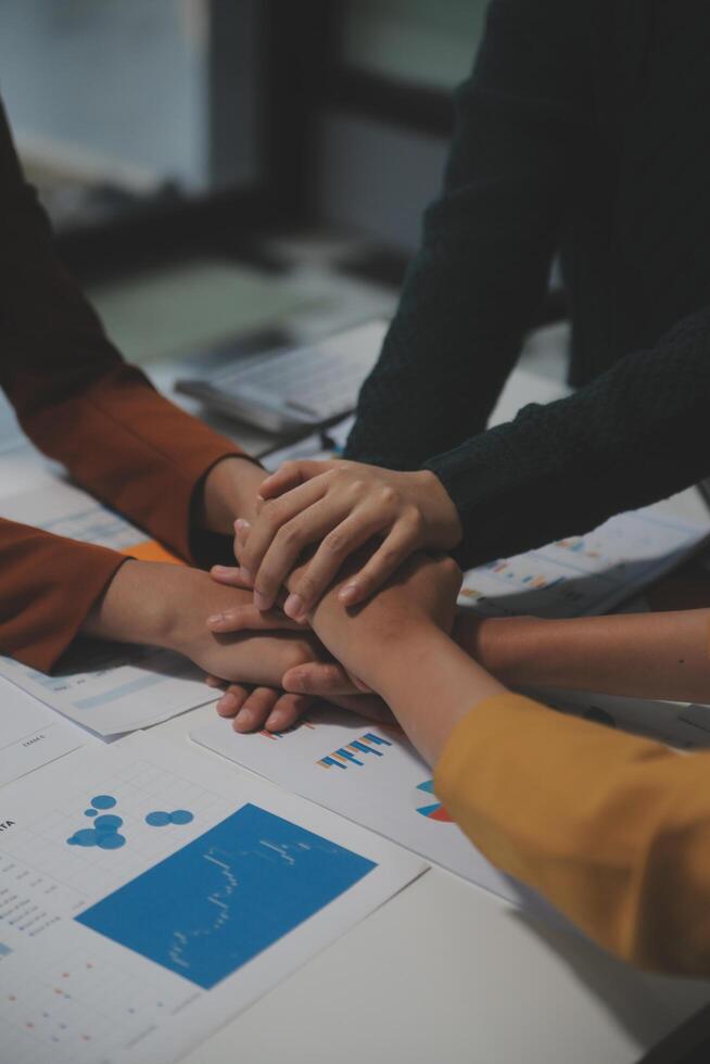 Hand join together for work togetherness, Hand stack for business and service, Team volunteering or teamwork. Concept connection of community and charity. Group of business workforce participation. photo