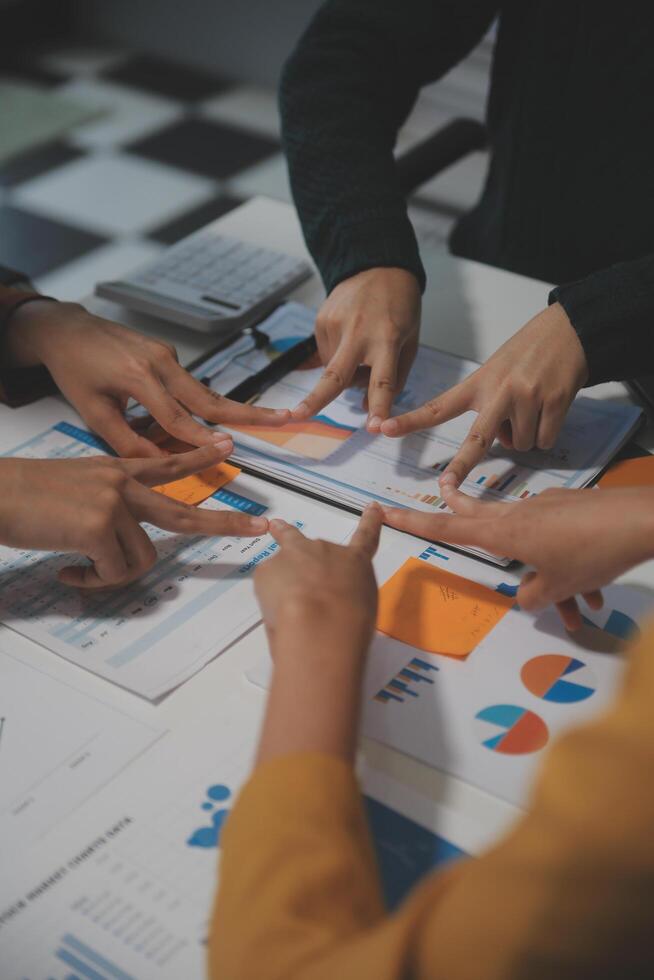 Hand join together for work togetherness, Hand stack for business and service, Team volunteering or teamwork. Concept connection of community and charity. Group of business workforce participation. photo