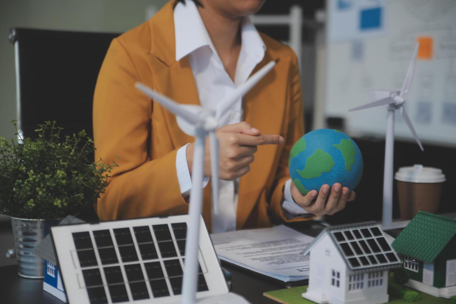 Carbon offset price report CO2 emission. Future growth Net zero waste in ESG ethical SME office protect climate change global warming social issues project. Group of asia people Eco friendly SDGs plan photo