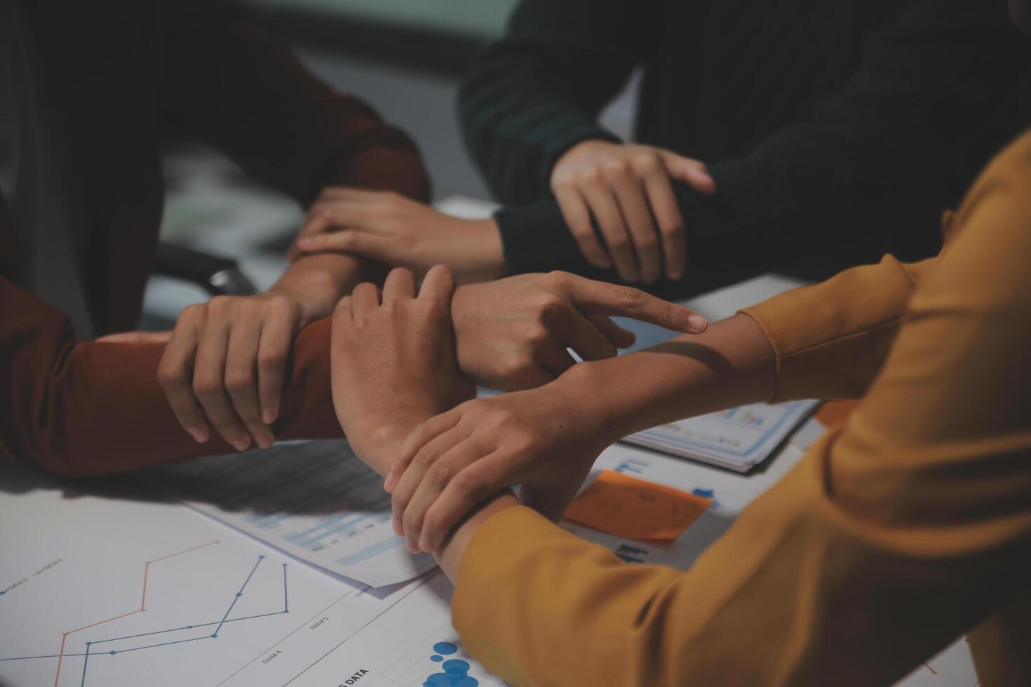 Hand join together for work togetherness, Hand stack for business and service, Team volunteering or teamwork. Concept connection of community and charity. Group of business workforce participation. photo