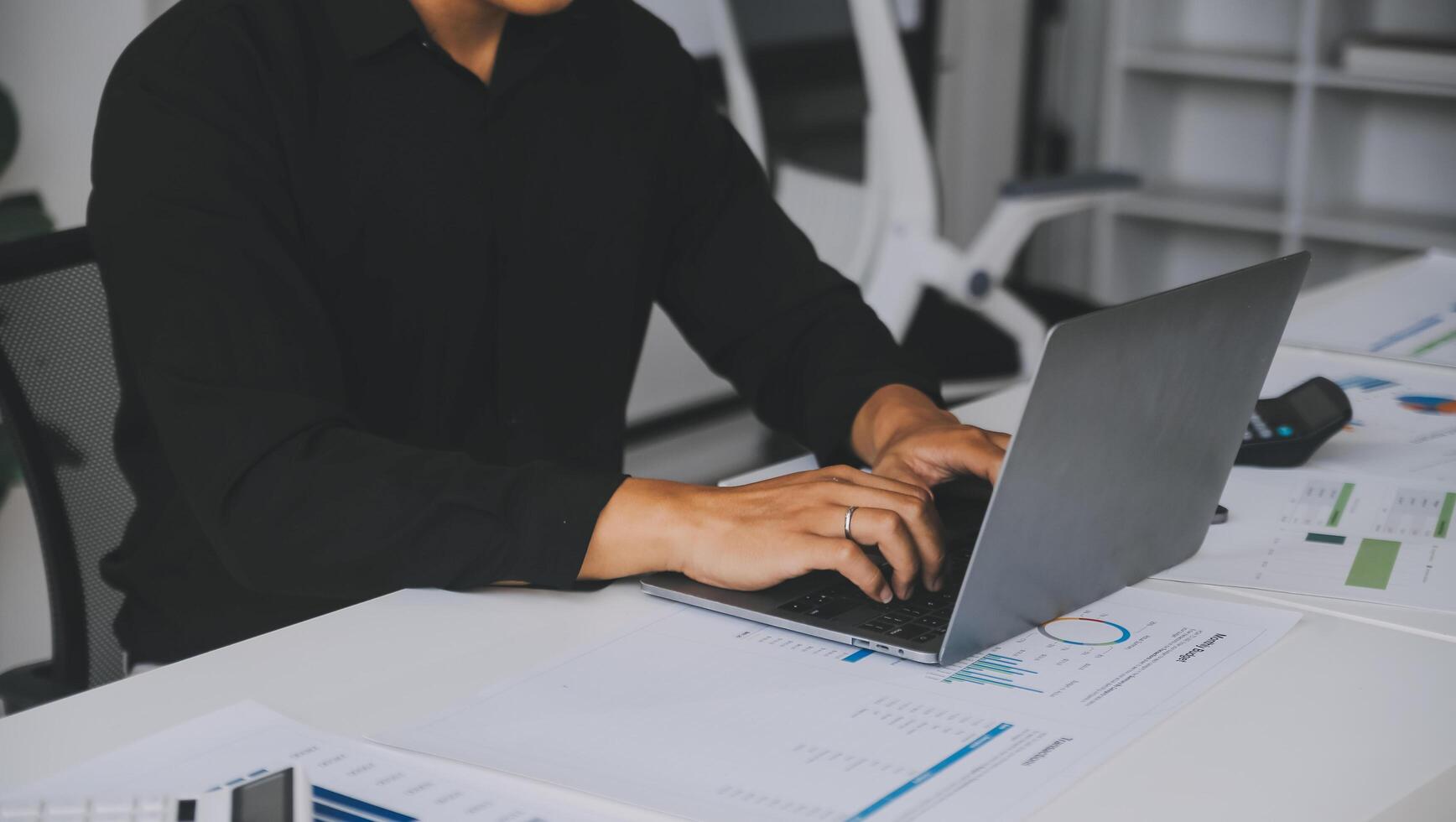 Financial analysts analyze business financial reports on a digital tablet planning investment project during a discussion at a meeting of corporate showing the results of their successful teamwork. photo