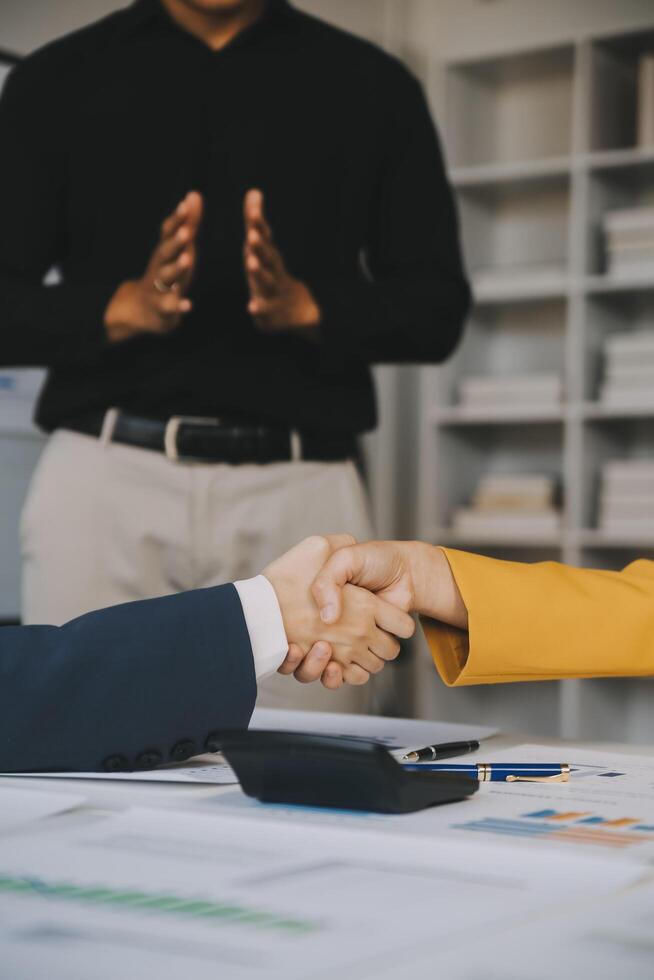 Business handshake for teamwork of business merger and acquisition,successful negotiate,hand shake,two businessman shake hand with partner to celebration partnership and business deal concept photo