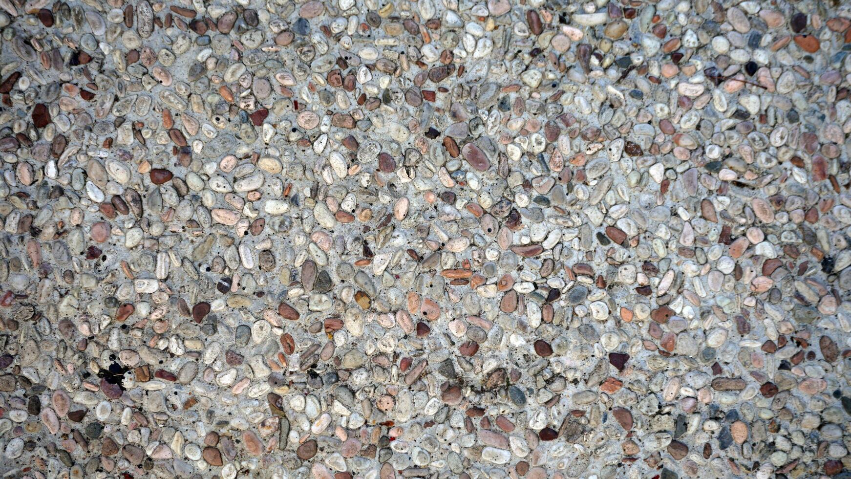 pebble stone texture background, soft stone surface. photo