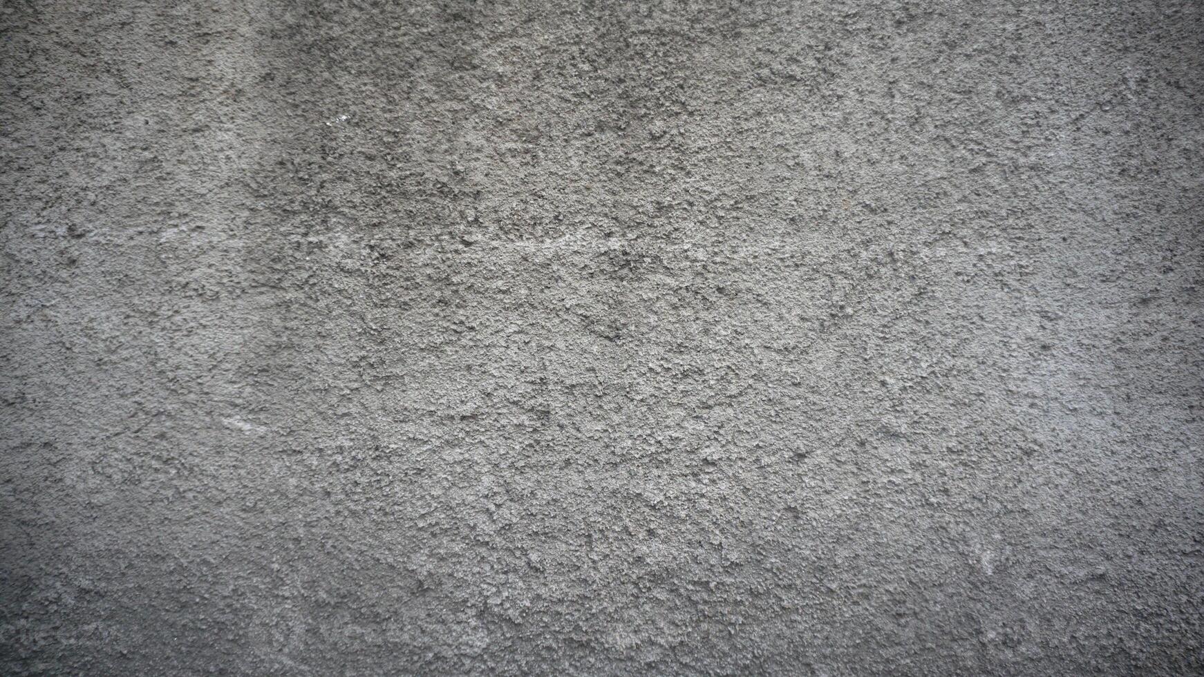 Texture of grey concrete wall for construction background. Blank plaster texture in vintage style. photo