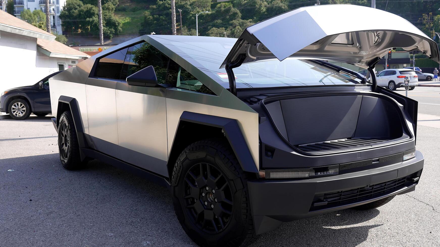 Modern electric car, Tesla Cybertruck outdoors. The concept of modern automotive technologies. Concept of using electric cars to protect the environment and transportation photo