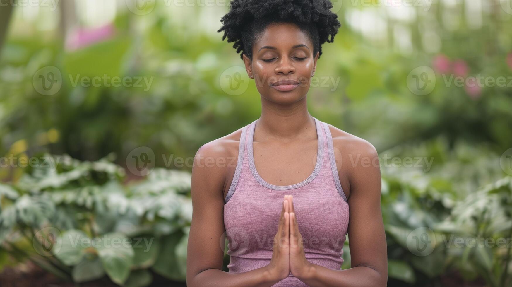 Woman Meditating in Peaceful Outdoor Greenery, Practicing Mindfulness and Yoga, Wearing Pink Tank Top, Tranquil Forest Setting, Calm and Relaxed Expression, Natural Light and Bokeh Effect photo
