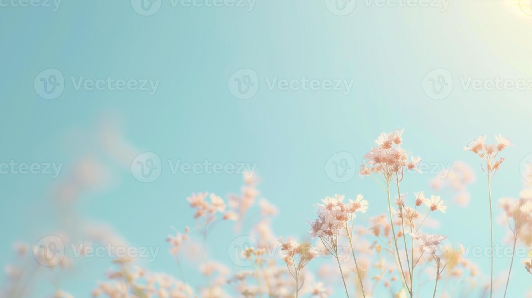 Delicate Pink Wildflowers on a Sunny Day Against a Clear Blue Sky, Ideal for Nature Photography and Spring-Themed Projects, Reflecting Peaceful Summer Days and Floral Beauty in Pastel Tones photo