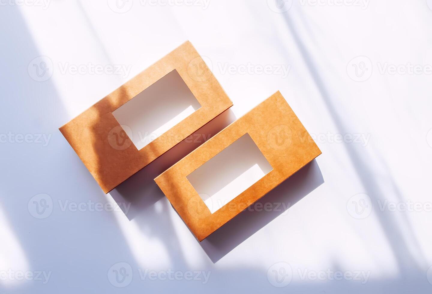 Empty cardboard boxes on white background. Eco-friendly packaging. photo
