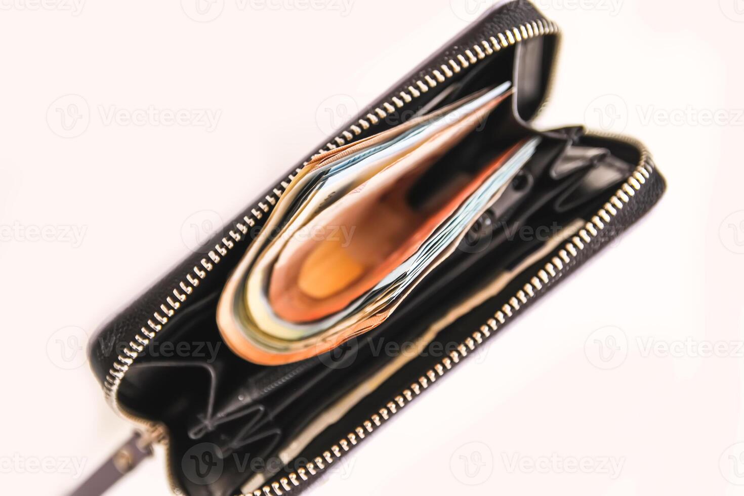 Euro money in the purple leather wallet. photo