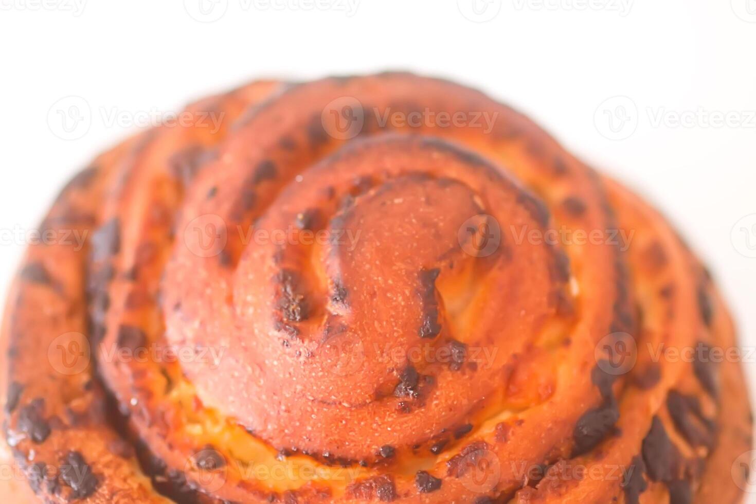 Freshly baked sweet cinnamon bun. photo