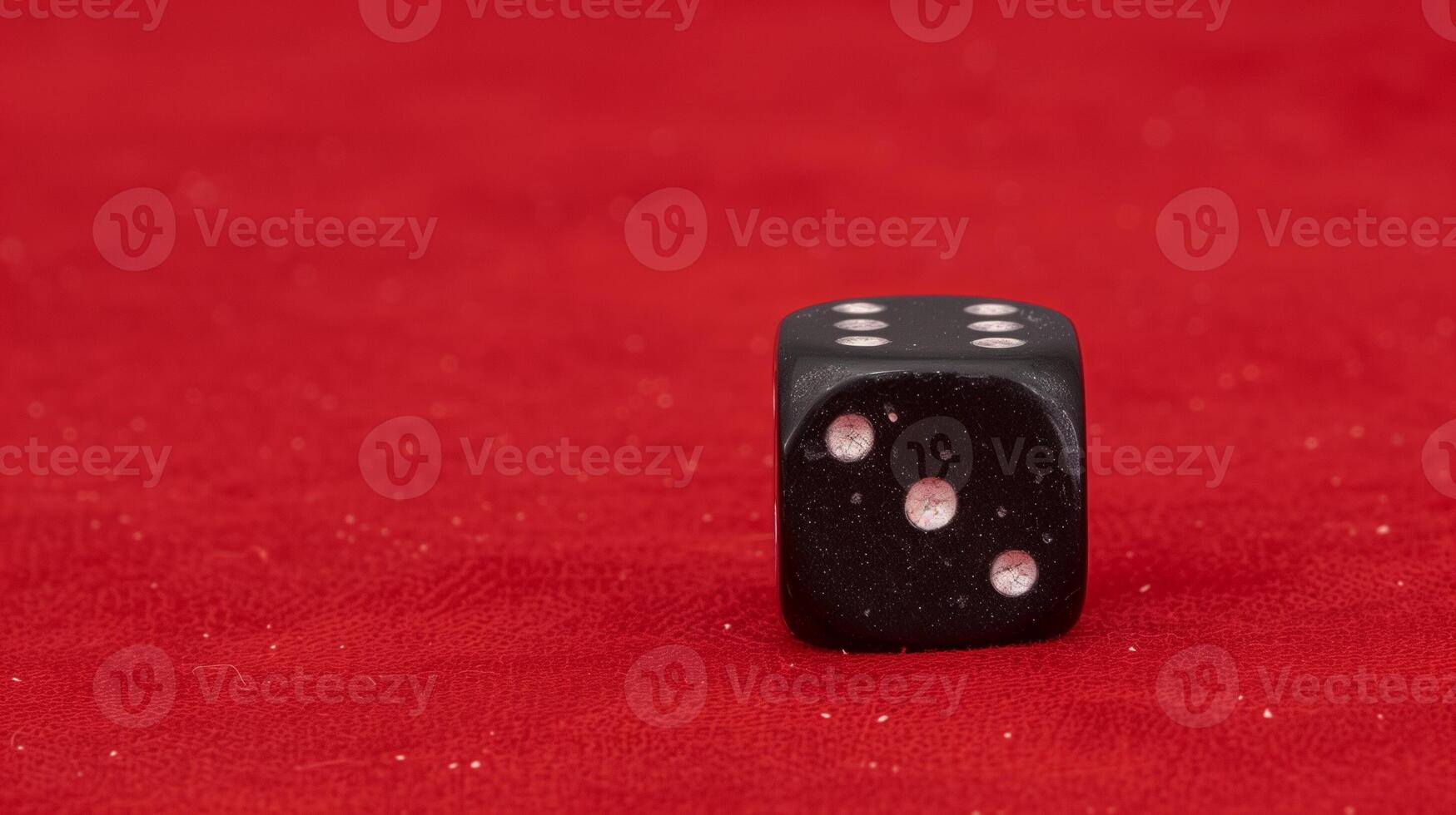 Black Dice with White Dots on Red Velvet Background - Gaming Chance Concept, Close-Up View, Luck Symbol photo