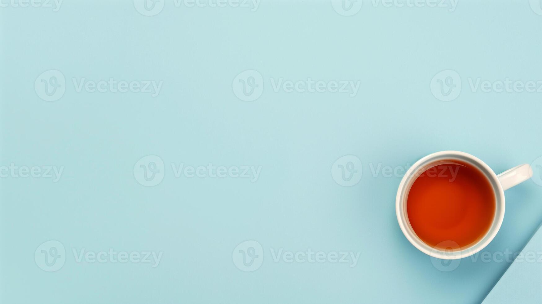 Cup of tea on blue background photo