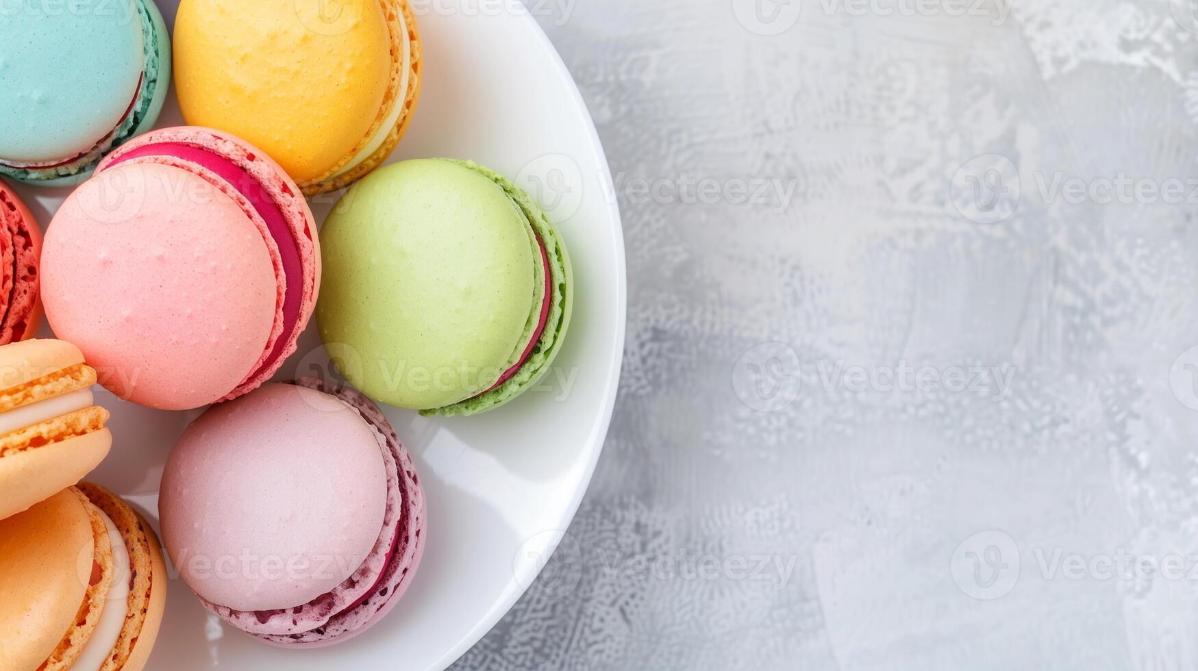 Overhead View of Neatly Stacked Colorful Macarons on White Plate with Textured Background, Perfect for Bakery Advertising, Confectionery Promotion, Pastry Blogs, Dessert Menus, and Food Photography photo