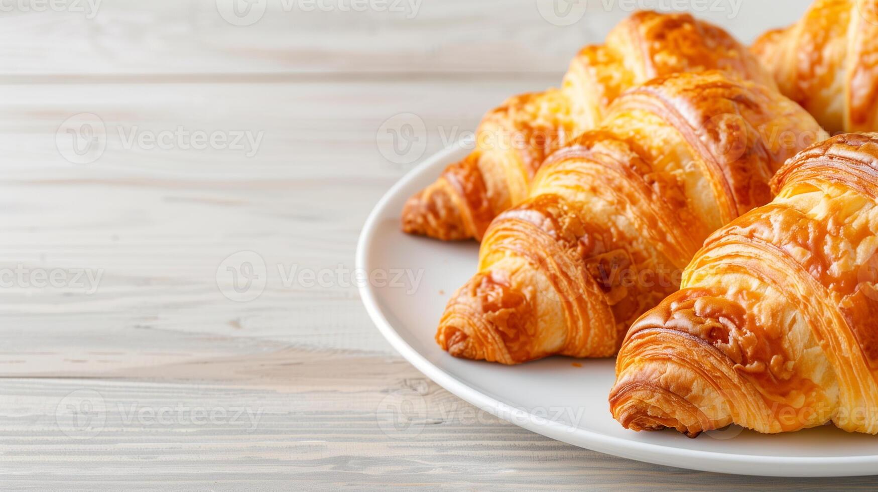 Freshly Baked Croissants Arranged on a White Plate on Wooden Table, Perfect for Breakfast, Bakery Display, or Cafe Promotion, Highlighting Golden, Flaky Crust Texture, Home Cooking Concept photo