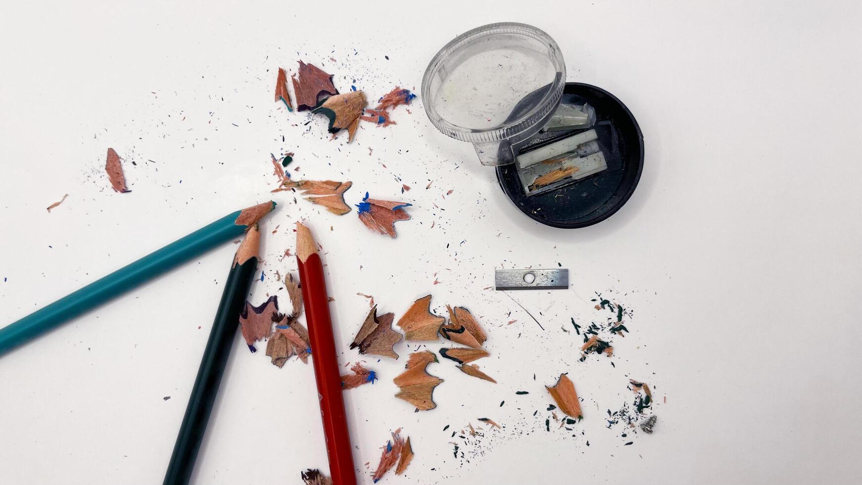 Broken graphite pencil on white background. School stationery photo