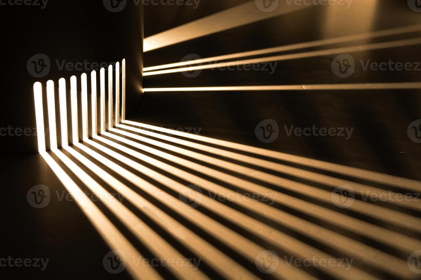 Rays of light are refracted on a black background. Background with a place for text in a stylish and modern concept for advertising phones, perfumes, appliances. photo