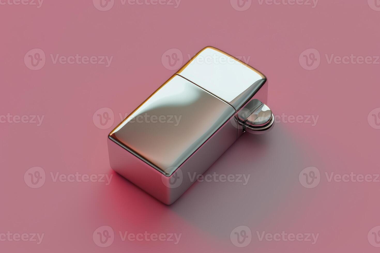 Metallic lighter resting on a pink surface with a soft glow photo