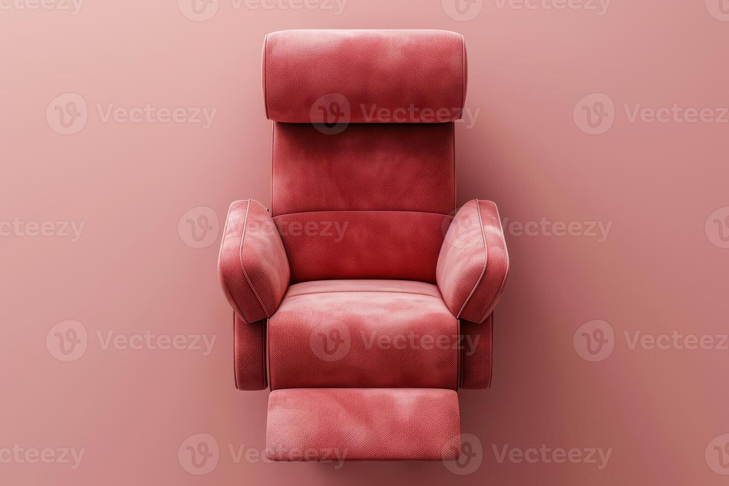 Comfortable recliner chair in soft red hue against a minimalist pink wall photo
