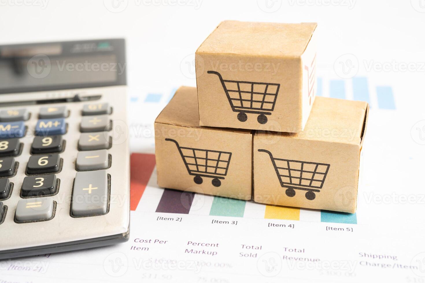 Shopping cart logo on box with magnifying glass on graph background. Banking Account, Investment Analytic research data economy, trading, Business import export transportation online company concept. photo