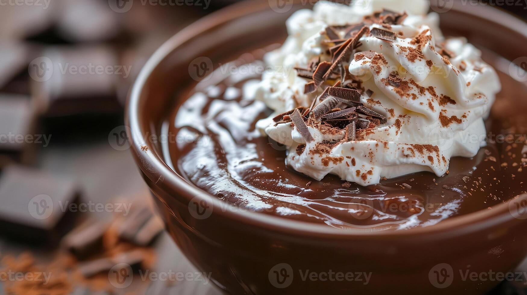 Delicious chocolate mousse topped with whipped cream and chocolate shavings in a rustic bowl. Perfect dessert for any occasion. photo