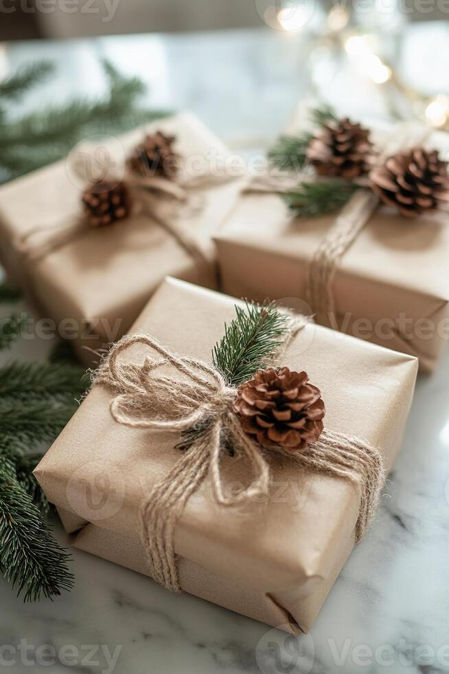Beautifully wrapped gifts using eco friendly materials and natural accents on a elegant table photo