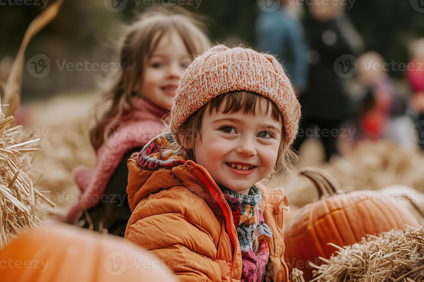 Families explore a pumpkin patch with children happily selecting pumpkins and playing around hay photo