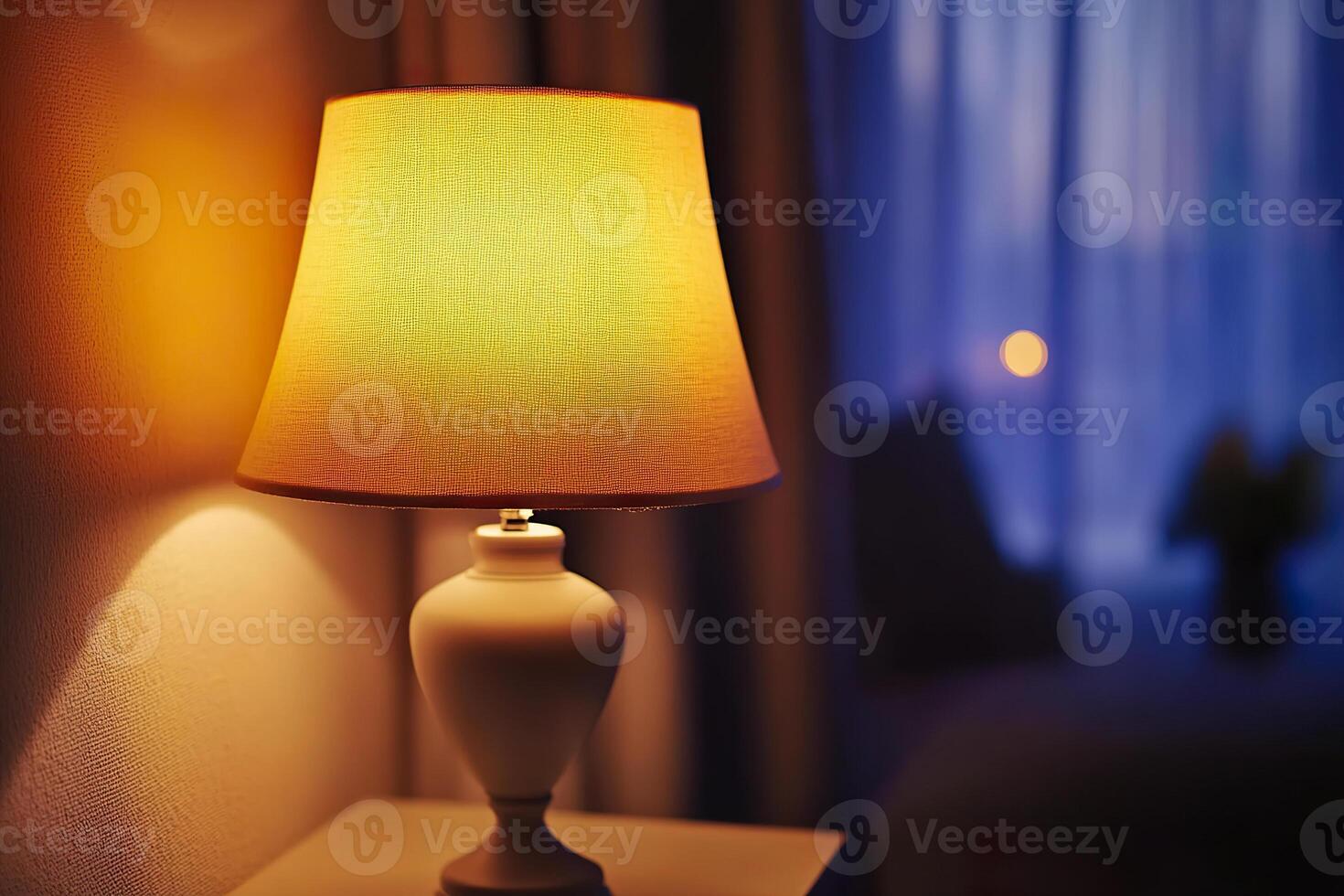 Warmly lit lamp creating a cozy atmosphere in a softly lit living room photo