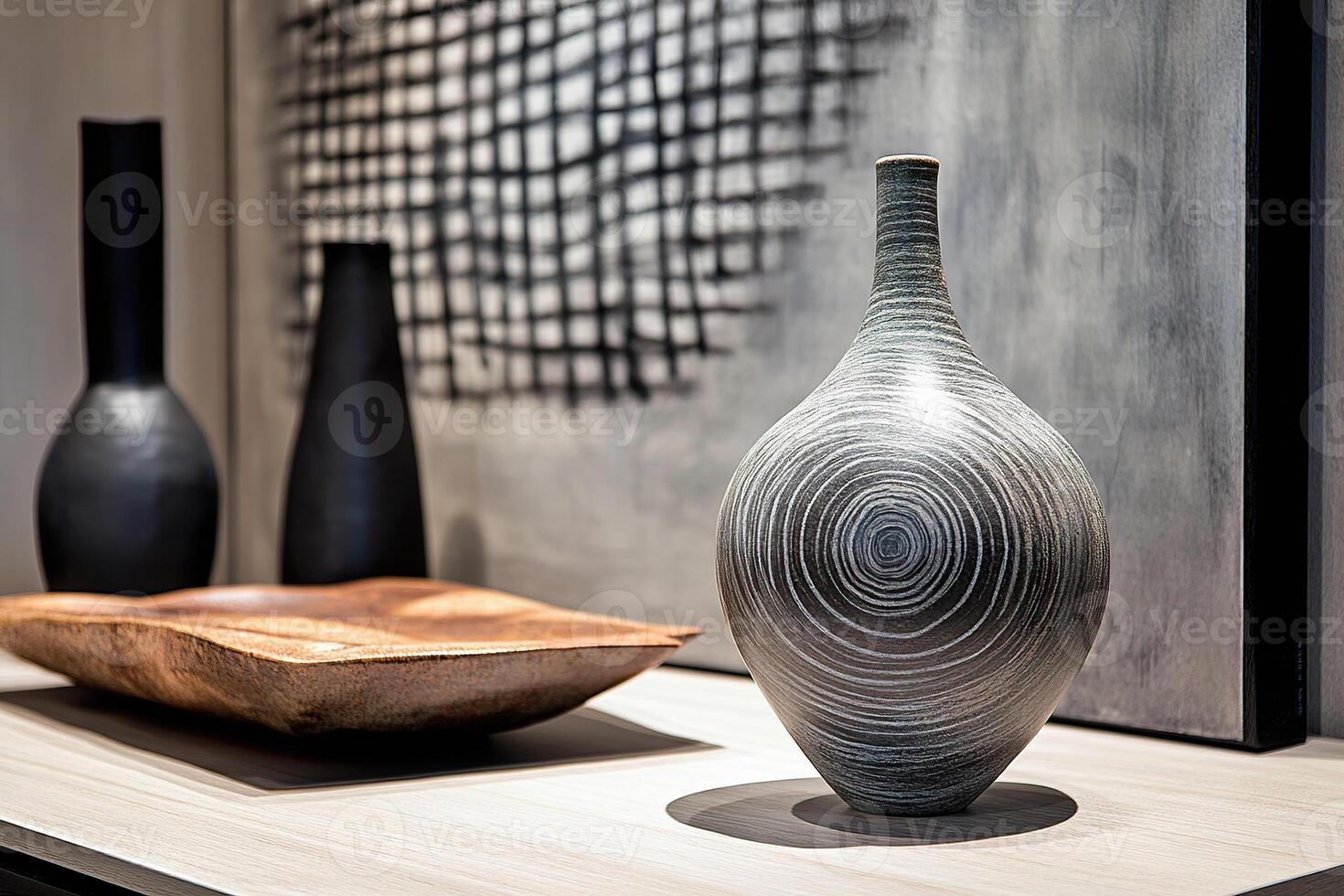 Elegant streamlined decor with sculptural vases and abstract art in modern setting photo