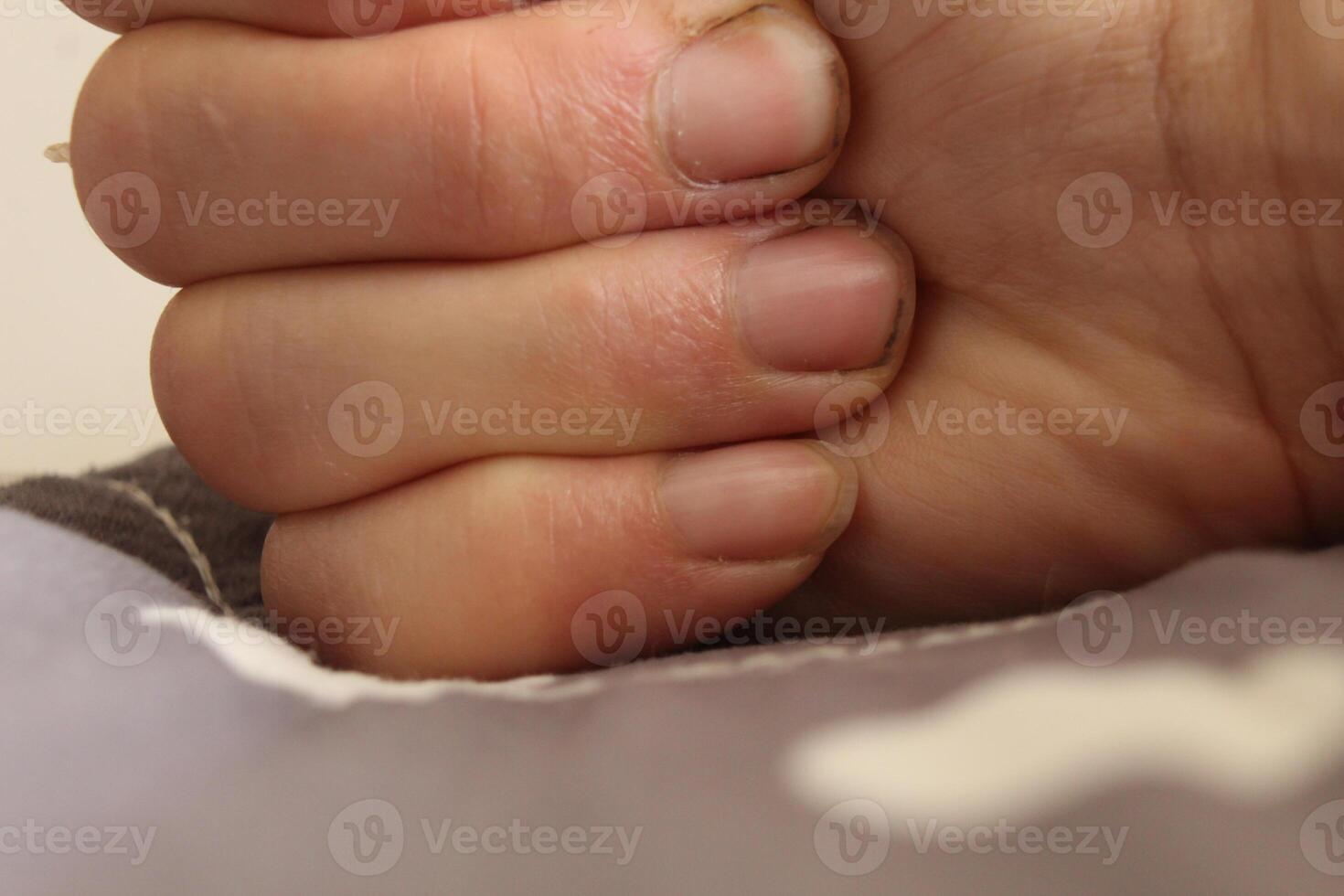 Hand close-up. Close-up fingers on a background with space for copyspace text photo