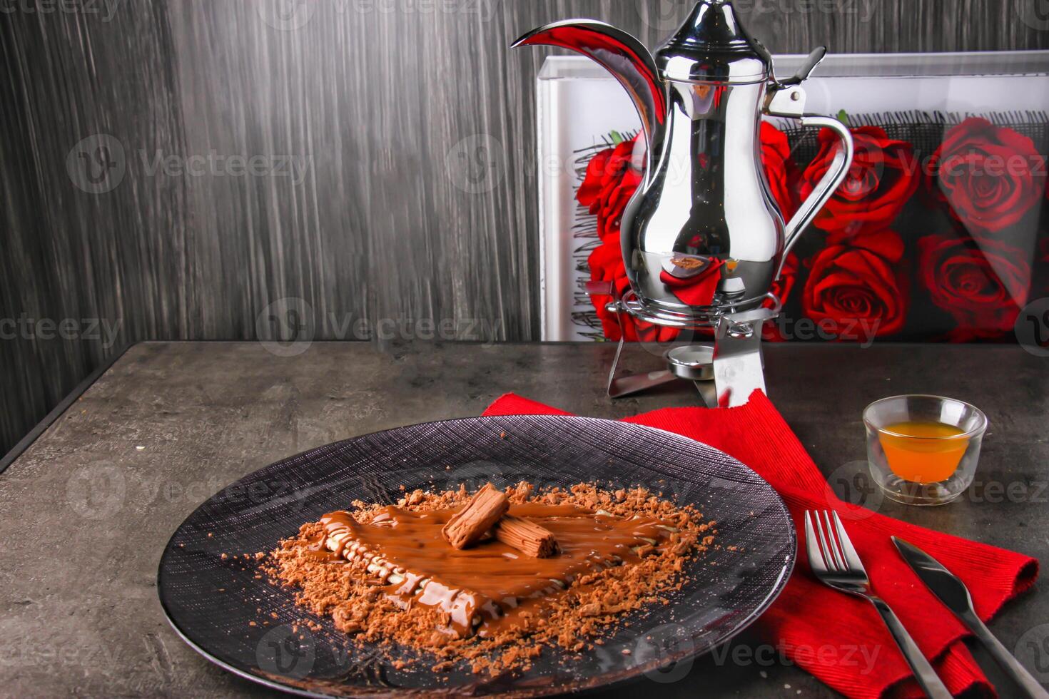 Chocolate Crepe with Arabic Coffee with rich chocolate sauce served in plate isolated on table side view of indulgent dessert photo