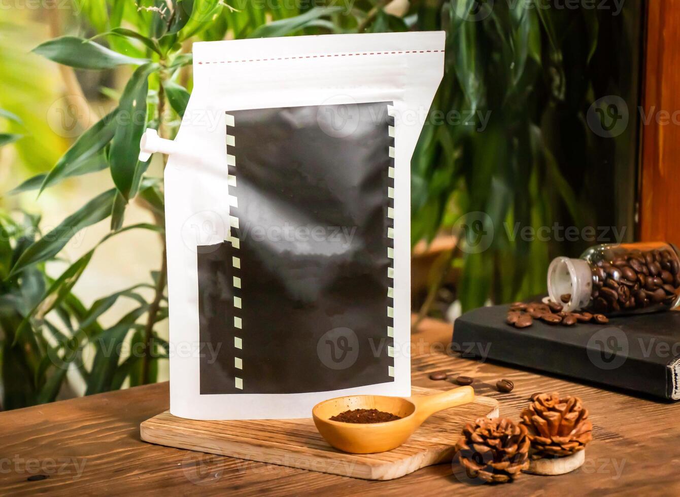 Coffee brewing bag mixed beans isolated on wooden table side view of taiwan coffee packing photo