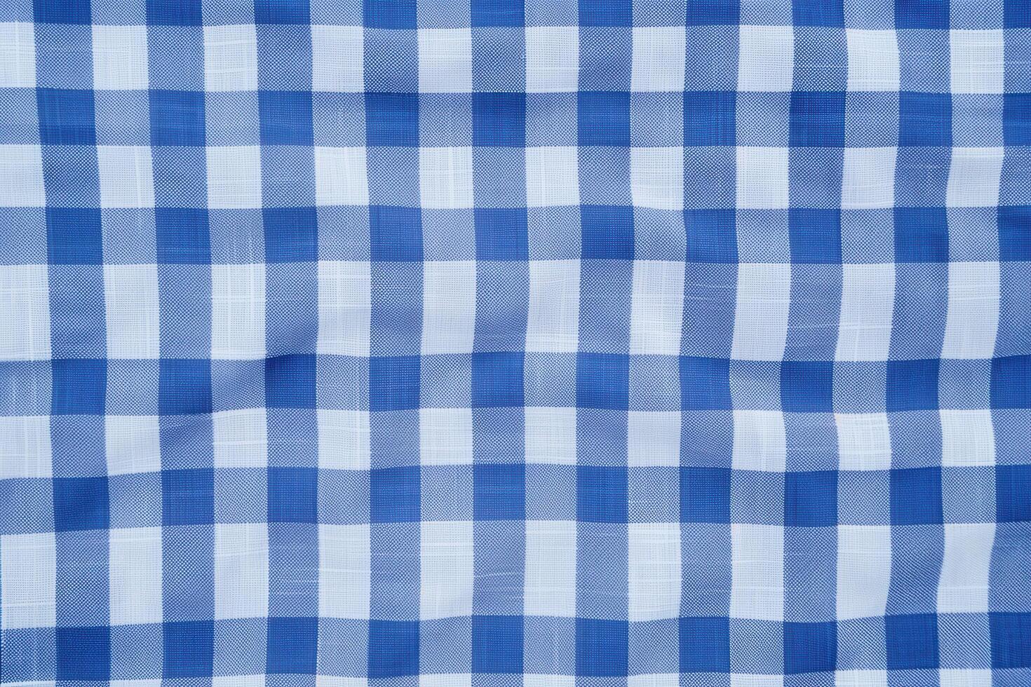 A classic blue and white gingham texture background adds a timeless, cheerful pattern to any design photo