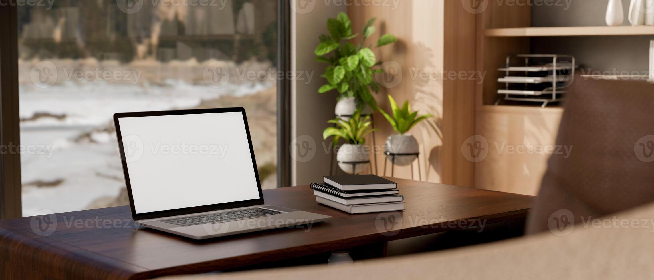 A laptop and books on a hardwood table against the window in a contemporary room. photo