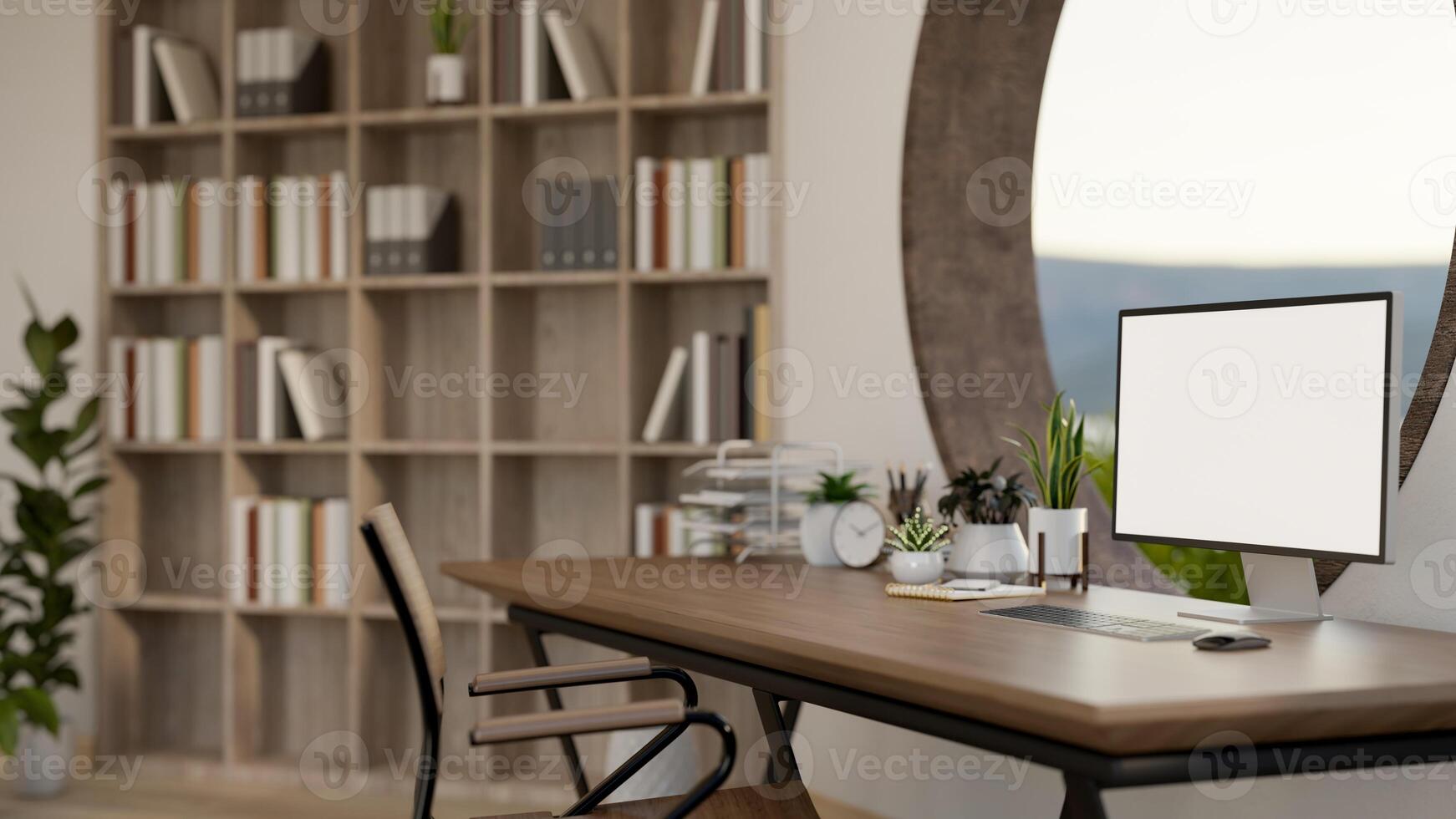 A computer mockup on a wooden desk against a round window in a contemporary room. photo