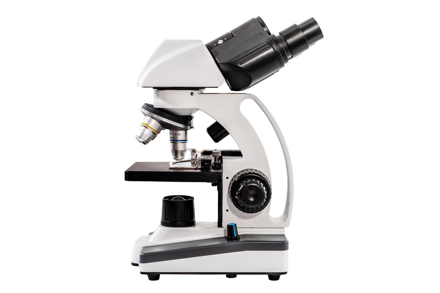 Side view of microscope for laboratory research isolated on white background, Magnification item for biology and chemical, medical research. White and black instrument for focusing. Macro lens photo