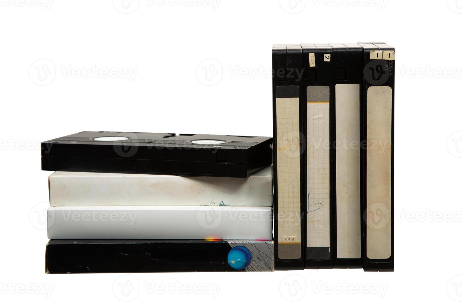 Pile of VHS cassettes. Vintage media. Isolate on a white back. photo