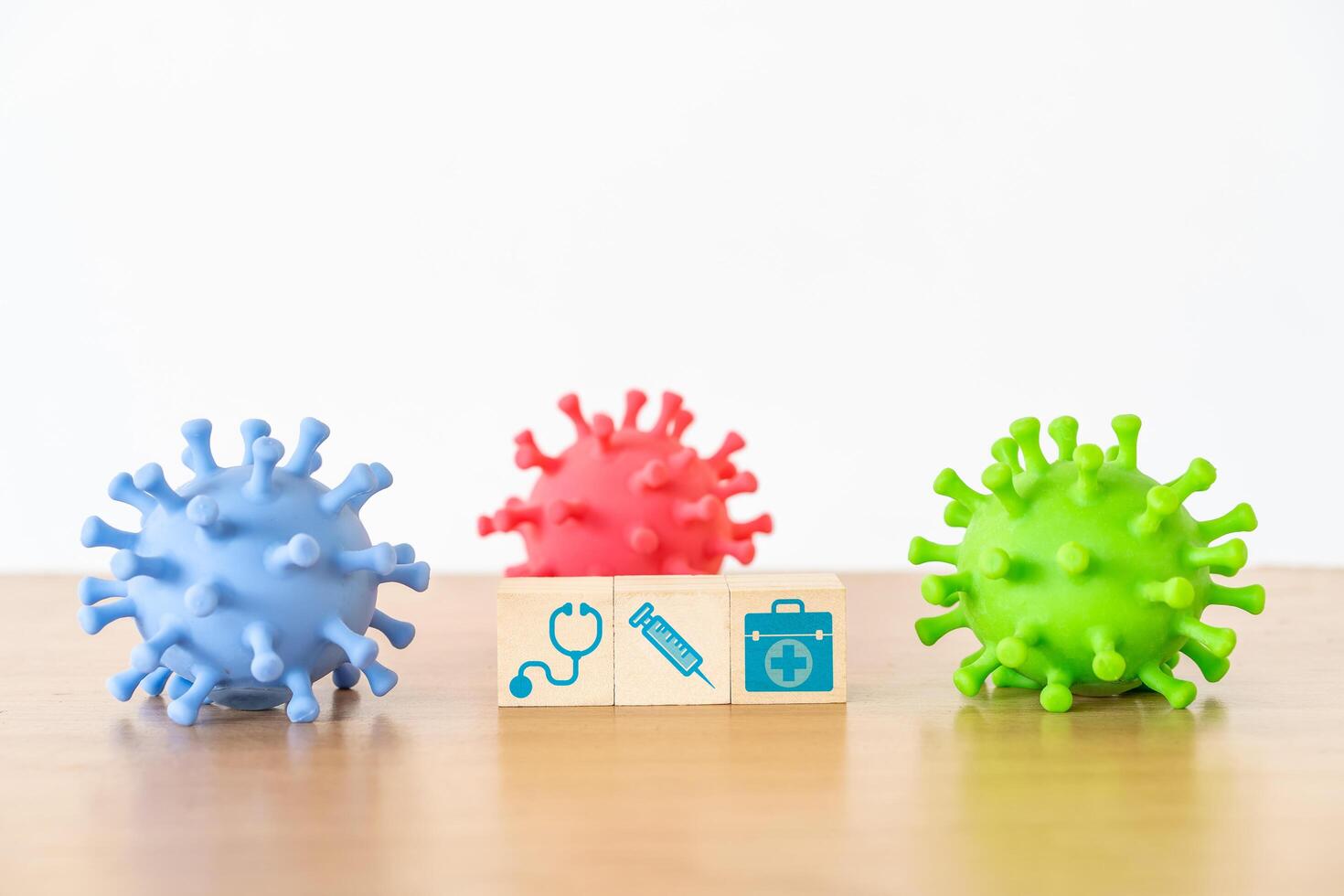 Healthcare. medical icon on wooden cube block stack on blue background with copy space, vaccination, laboratory, virus prevention, health, medical technology and insurance concept photo