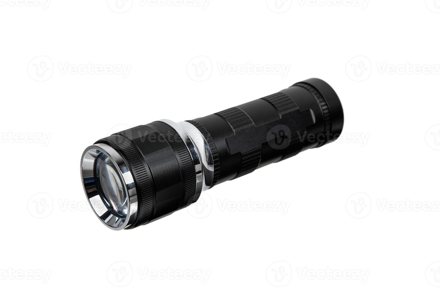 Modern metal LED flashlight in black color. Portable flashlight isolate on a white back photo