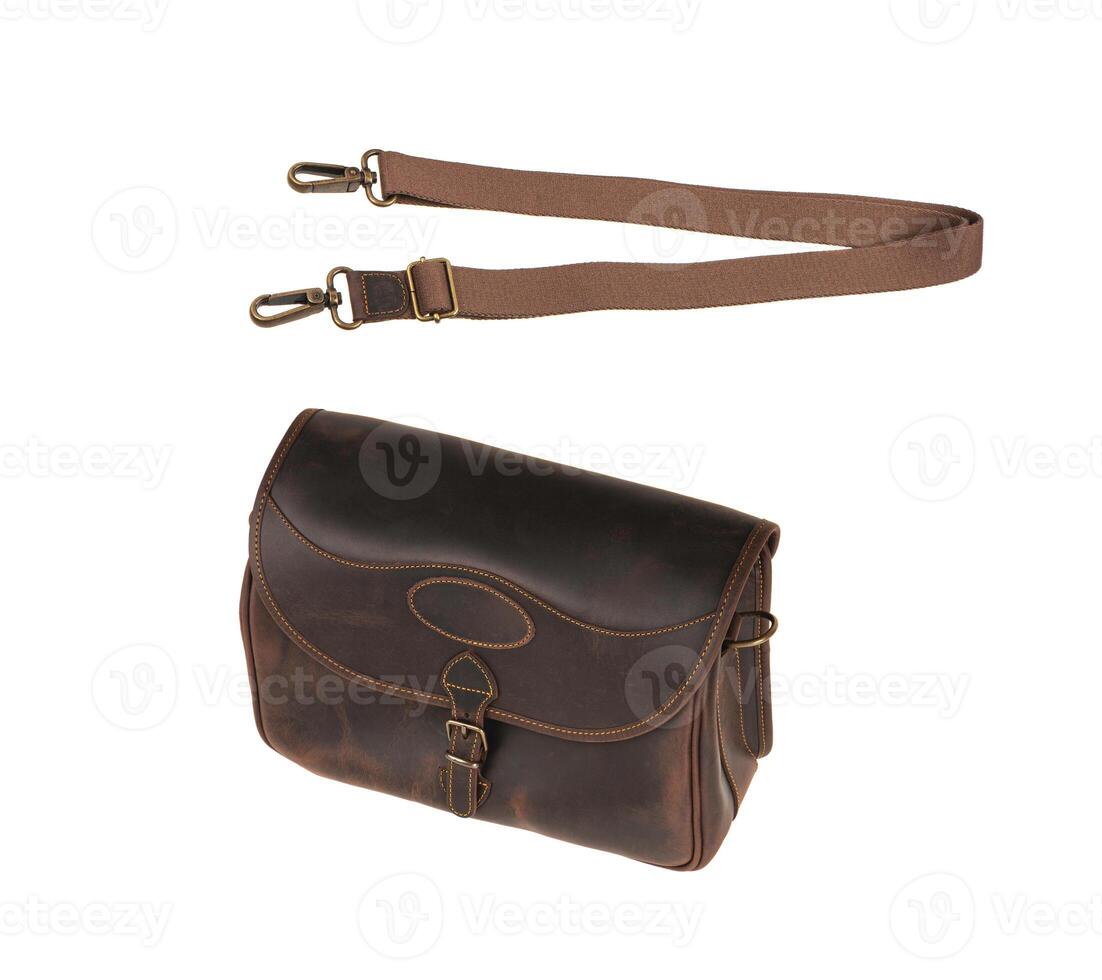 Brown leather bag with metal clasp. Isolate on a white back photo