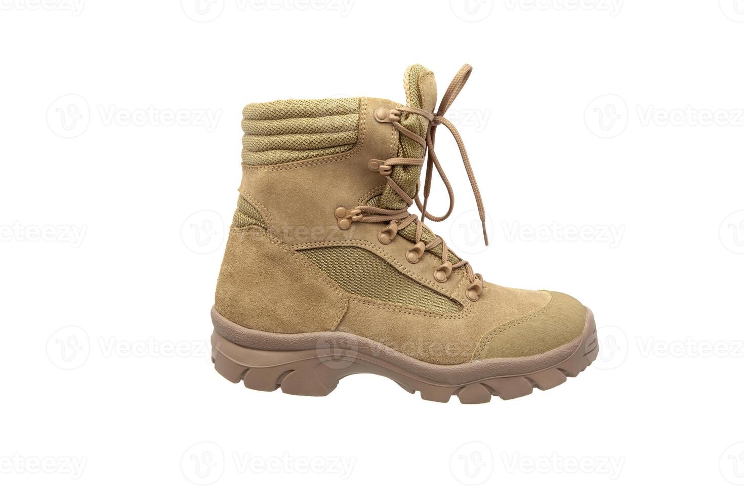 Modern army combat boots. New desert beige shoes. Isolate on a white back. photo